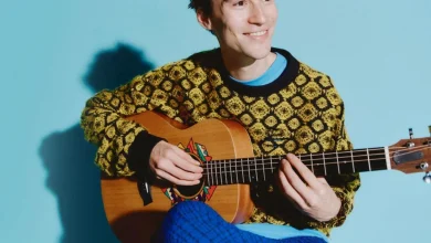 Jacob Collier champions the five-string guitar revolution with two new Taylor signature models