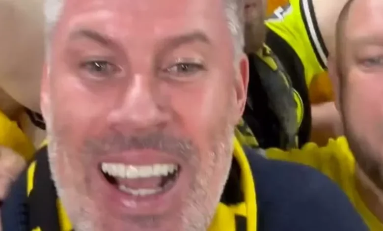 Jamie Carragher says 'they are giving me beers' as he marches with Dortmund fans