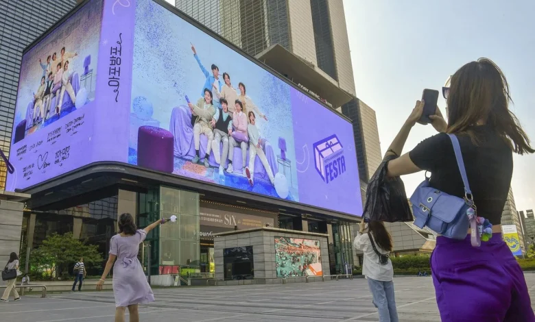 Japan woman indicted in South Korea for allegedly forcibly kissing BTS member