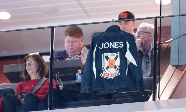 Jones’s jacket hangs in suite as family members watch Canadian Curling Trials
