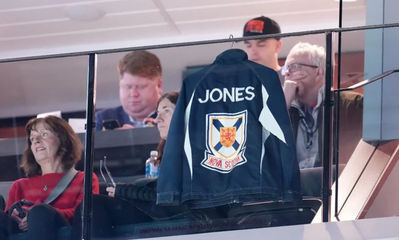 Jones's jacket hangs in suite while family look on at Canadian Curling Trials