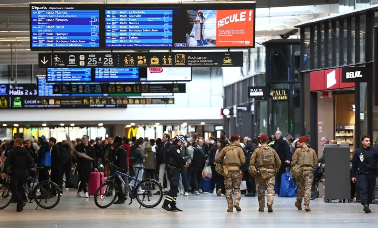 Knifeman who ‘threatened to slit child & woman’s throats' shot at station