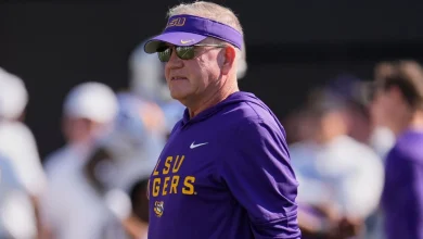LSU formally acts to fire Kelly in response to suit