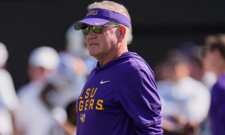LSU formally acts to fire Kelly in response to suit