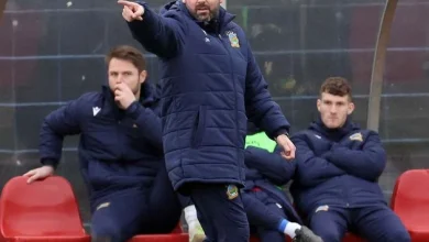 Latest battle in a long war between former team-mates Jim Magilton and David Healy