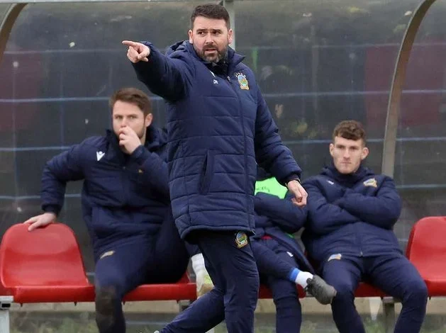 Latest battle in a long war between former team-mates Jim Magilton and David Healy