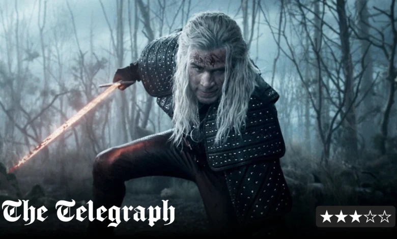 Liam Hemsworth dons Henry Cavill’s wig for superbly silly return of The Witcher