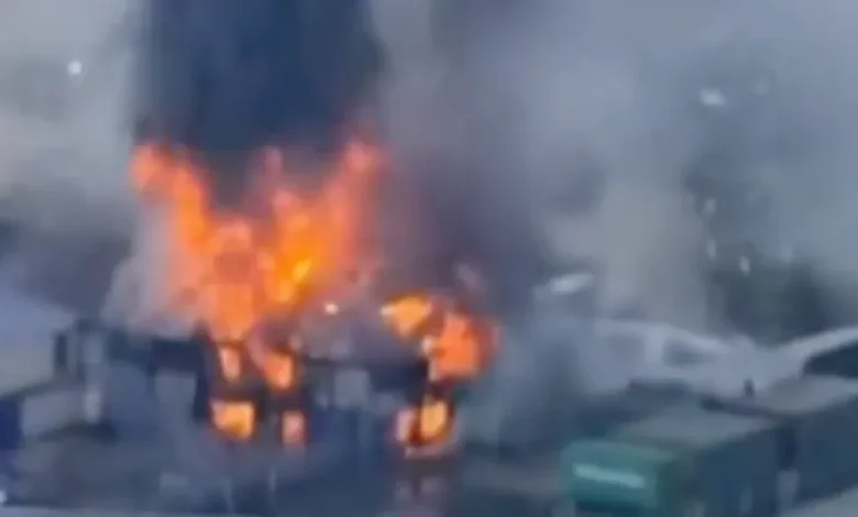 Loud bangs heard as huge blaze erupts in London and thick plumes of smoke engulf skyline seen for miles