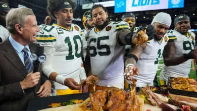 Love throws four touchdowns as Packers beat Lions for Thanksgiving triumph