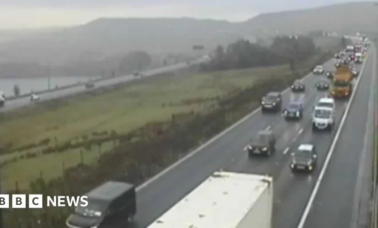 M62 delays after crash causes fuel spill