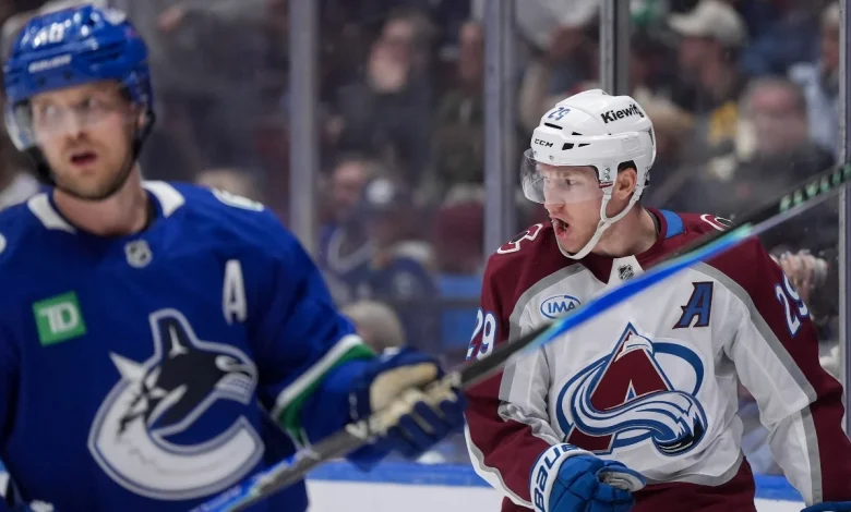 MacKinnon nets five points as Avalanche beat Canucks in overtime