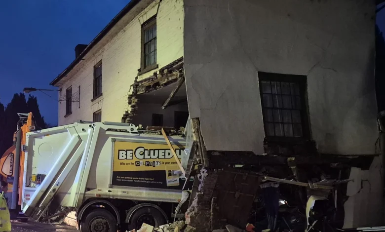 Man dies after bin lorry crashes into building in Herefordshire town | ITV News