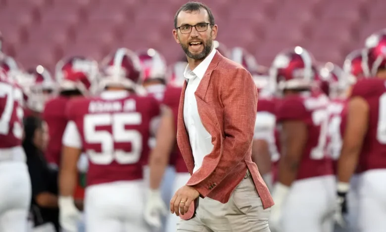 Mid-interview, Andrew Luck gets great view of Stanford fumble return TD
