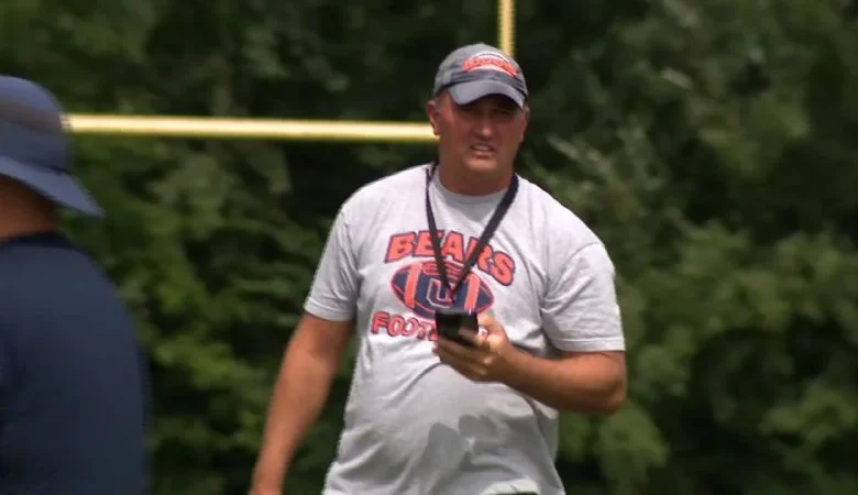 Missing Virginia football coach is wanted on child pornography and other charges, police say