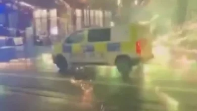 Moment firework explodes in front of police officer during city centre mayhem