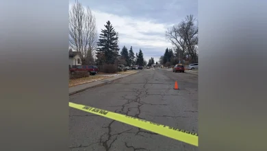 Motorcyclist hit stop sign, pole after being thrown from bike in NW Calgary crash
