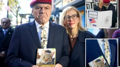 NYC mayoral hopeful Curtis Sliwa shows up to election poll site in cat tie and a book for feline lovers