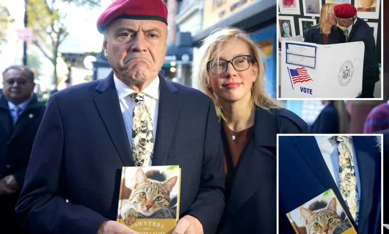 NYC mayoral hopeful Curtis Sliwa shows up to election poll site in cat tie and a book for feline lovers