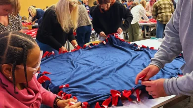 Navy Federal employees craft 500 blankets for vets with Soldiers' Angels in Pensacola