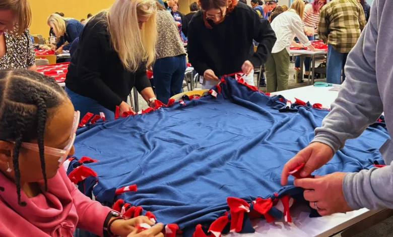 Navy Federal employees craft 500 blankets for vets with Soldiers' Angels in Pensacola