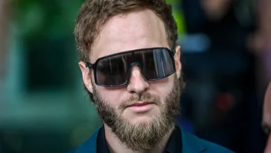 Neo-Nazi leader arrested by AFP at Bondi over alleged harassment of federal MP