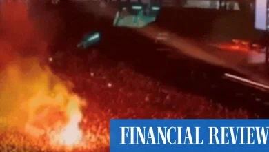 Oasis frontman unleashes after flares thrown into crowd