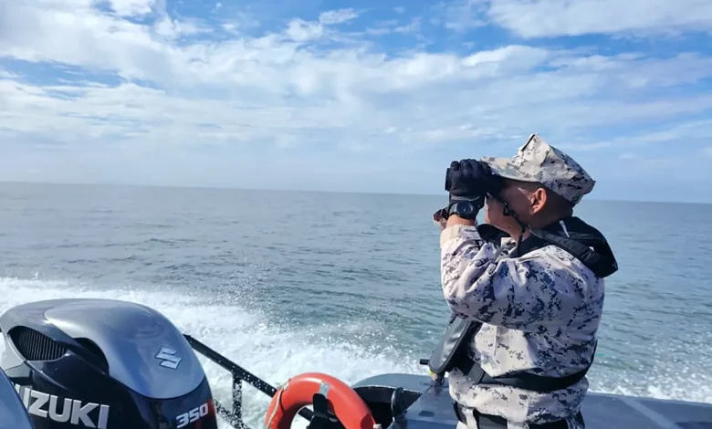 One dead, dozens missing after migrant boat sinks off Malaysian coast