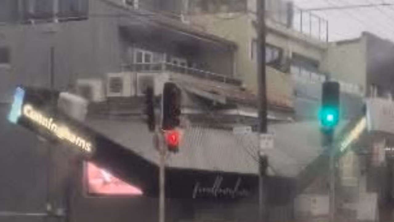 One dead, train chaos after storms lash NSW