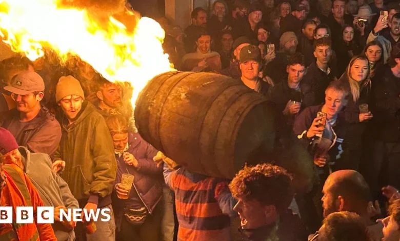 Otter St Mary Tar Barrel event sees thousands flock to town