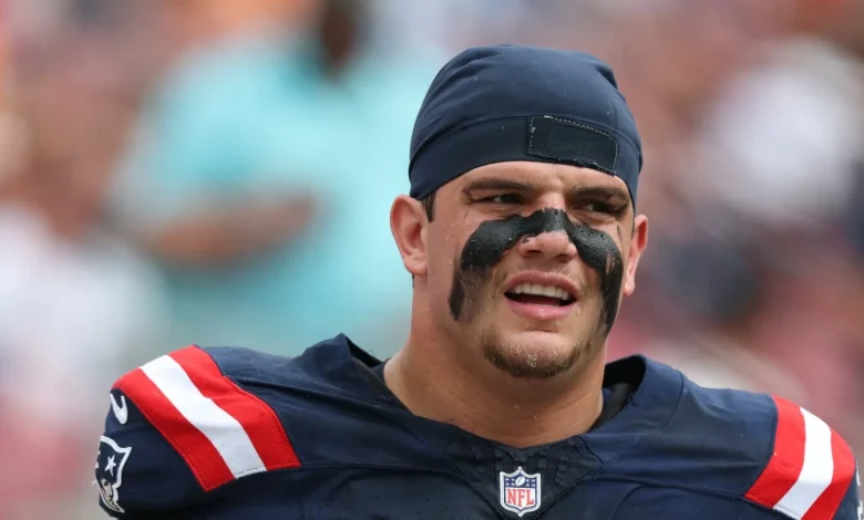 Patriots LT Will Campbell carted off with knee injury