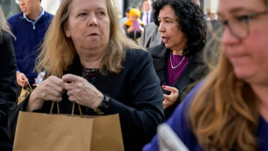 Photos of Americans turning to food pantries as shutdown drags on