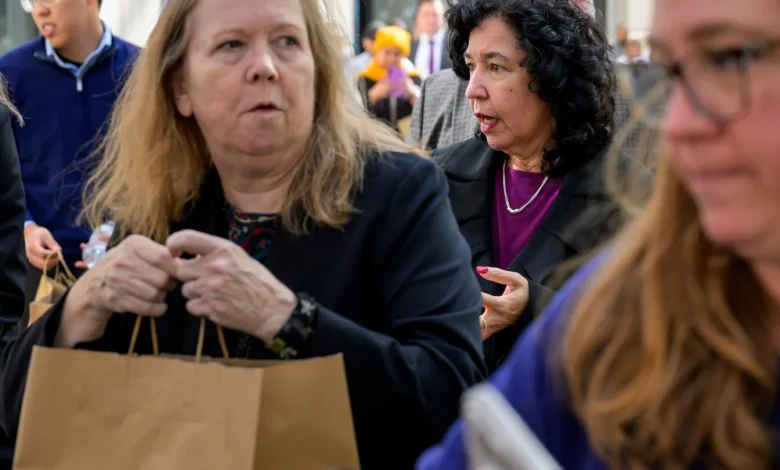 Photos of Americans turning to food pantries as shutdown drags on
