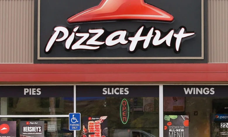Pizza Hut’s parent company says it’s considering selling the chain