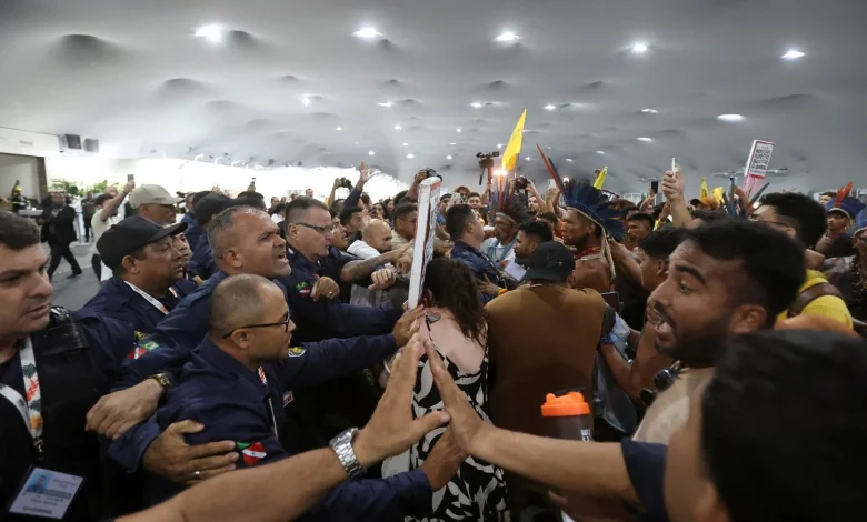 Protesters armed with batons storm COP30 venue in Brazil