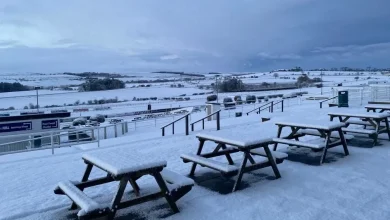 Racing abandoned at Britain's most scenic racecourse as thick blanket of snow covers track amid weather warning