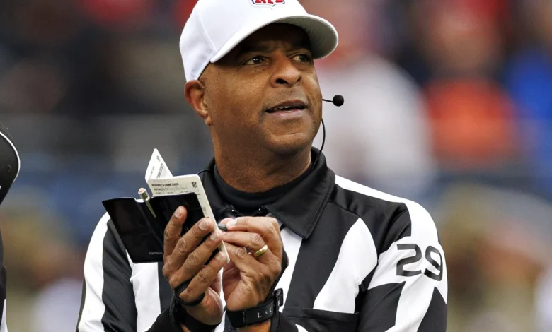 Referee Adrian Hill carted off with a leg injury