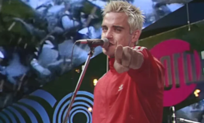 Robbie Williams Flashes Back to 1995 for New Video "Pretty Face"