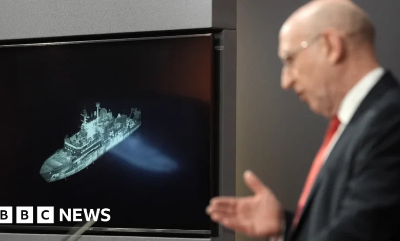 Russian spy ship on edge of UK waters, defence secretary says