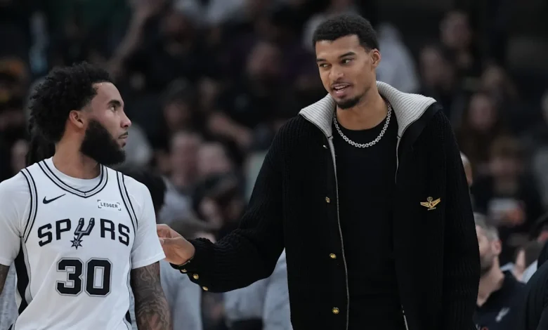 San Antonio's Victor Wembanyama to miss at least 2-3 weeks with strained calf, AP source says