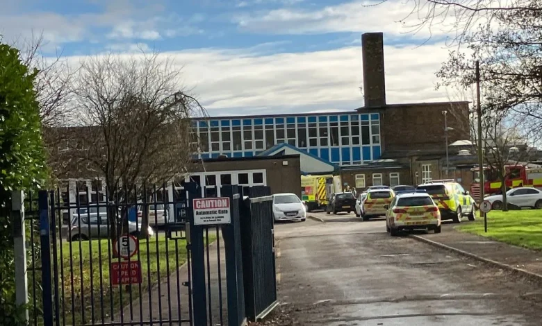 School 'chemical spill' leaves five in hospital including three teens as police swoop on science class