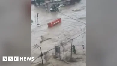 Shipping containers swept away in deadly Philippines floods