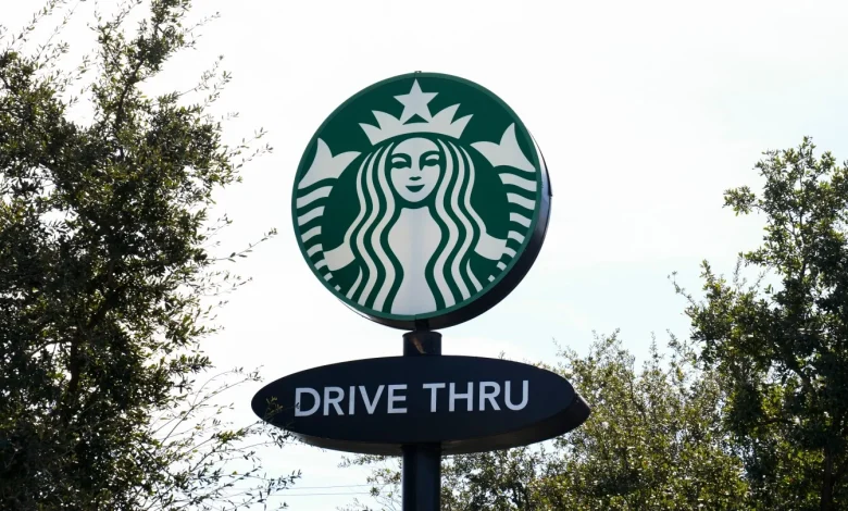 Starbucks workers kick off 65-store US strike on company’s busy Red Cup Day