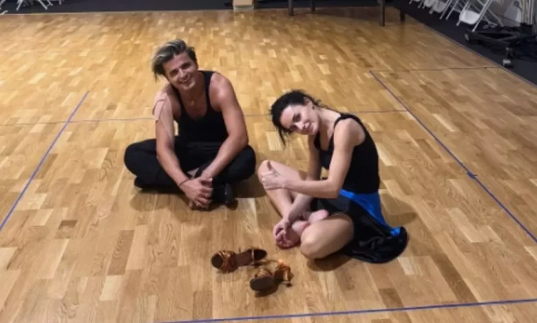 Strictly's Nikita Kuzmin says Amber Davies 'fighting for our spot' in training update
