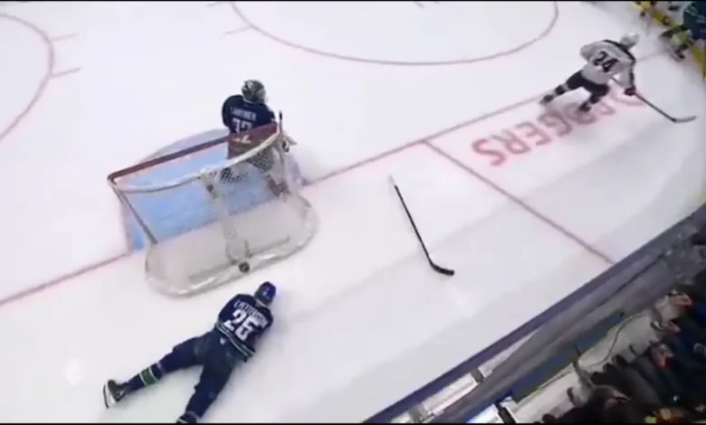 Suspension Incoming? Canucks' Elias Pettersson Exits Game Injured After Nasty Hit From Mathieu Olivi