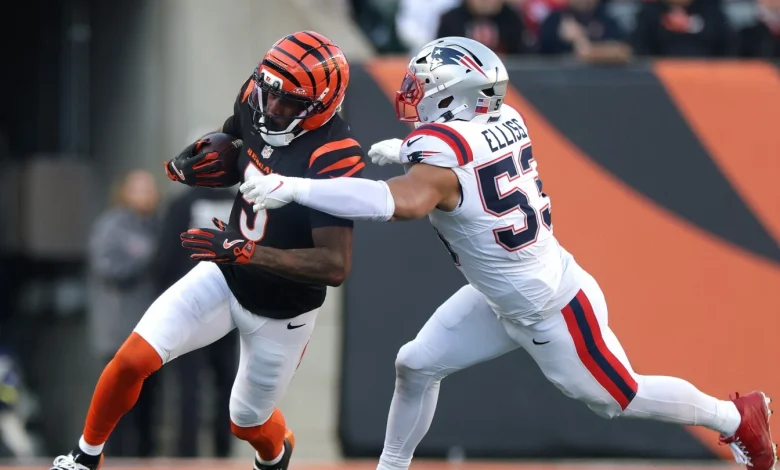 Tee Higgins carted off after hitting head; Joe Flacco leaves briefly with finger injury