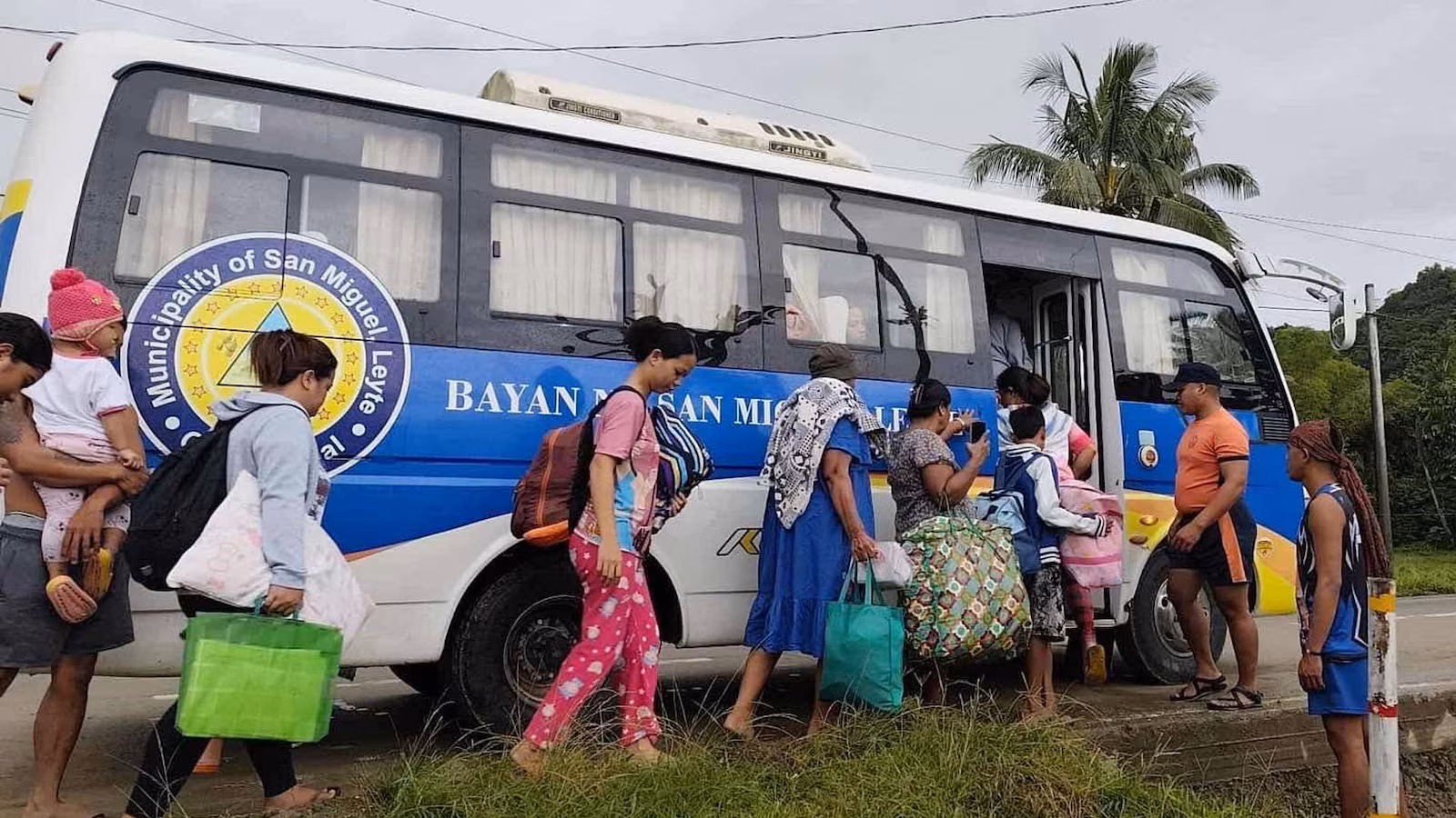 Tens of thousands of people evacuate to safety as typhoon approaches eastern Philippines