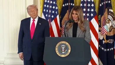 The president and the first lady ignored shouted questions about the notorious child sex trafficker.