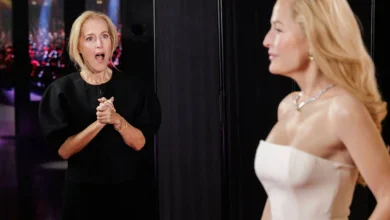 The truth is out there...Gillian Anderson meets her Madame Tussauds waxwork styled in her famous Golden Globes dress