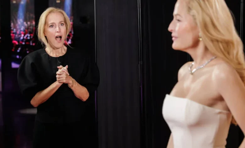 The truth is out there...Gillian Anderson meets her Madame Tussauds waxwork styled in her famous Golden Globes dress