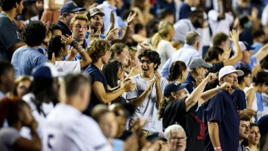 This college wants more students at a big football game. It's offering free beer.